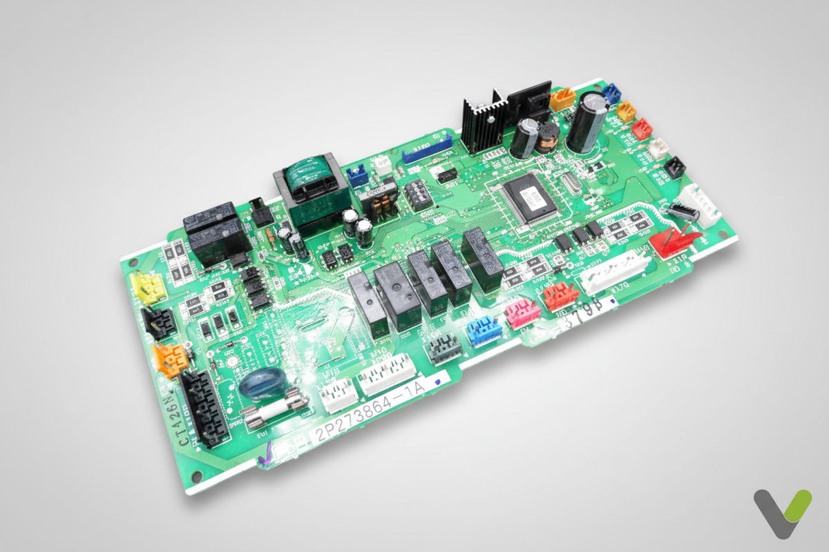 Daikin control PCB 5006570 angled view on grey studio background