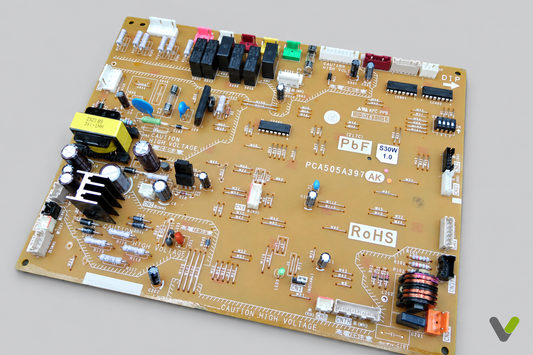 Nibe PWB-1 tan control PCB component-side angled view on flat light-grey background with small V watermark