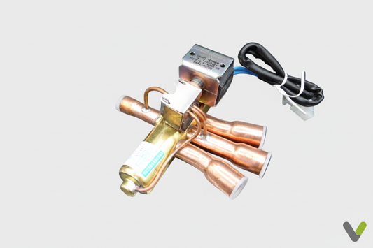 Nibe 4 Way Valve 524284 on light grey background with Varme Tec V logo