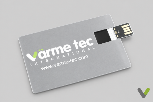 Nibe software-update USB stick on a light grey background, angled view