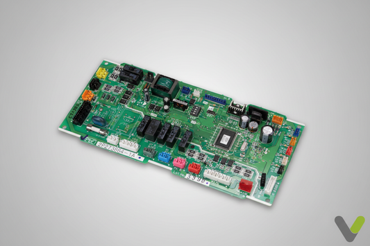 Daikin control PCB 5006570 top-down view on grey studio background